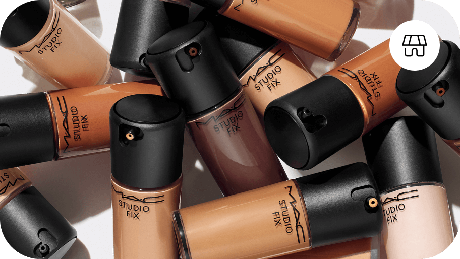 An image of lots of different bottles of Mac studio fix in different shades with a little store icon in the top right hand corner