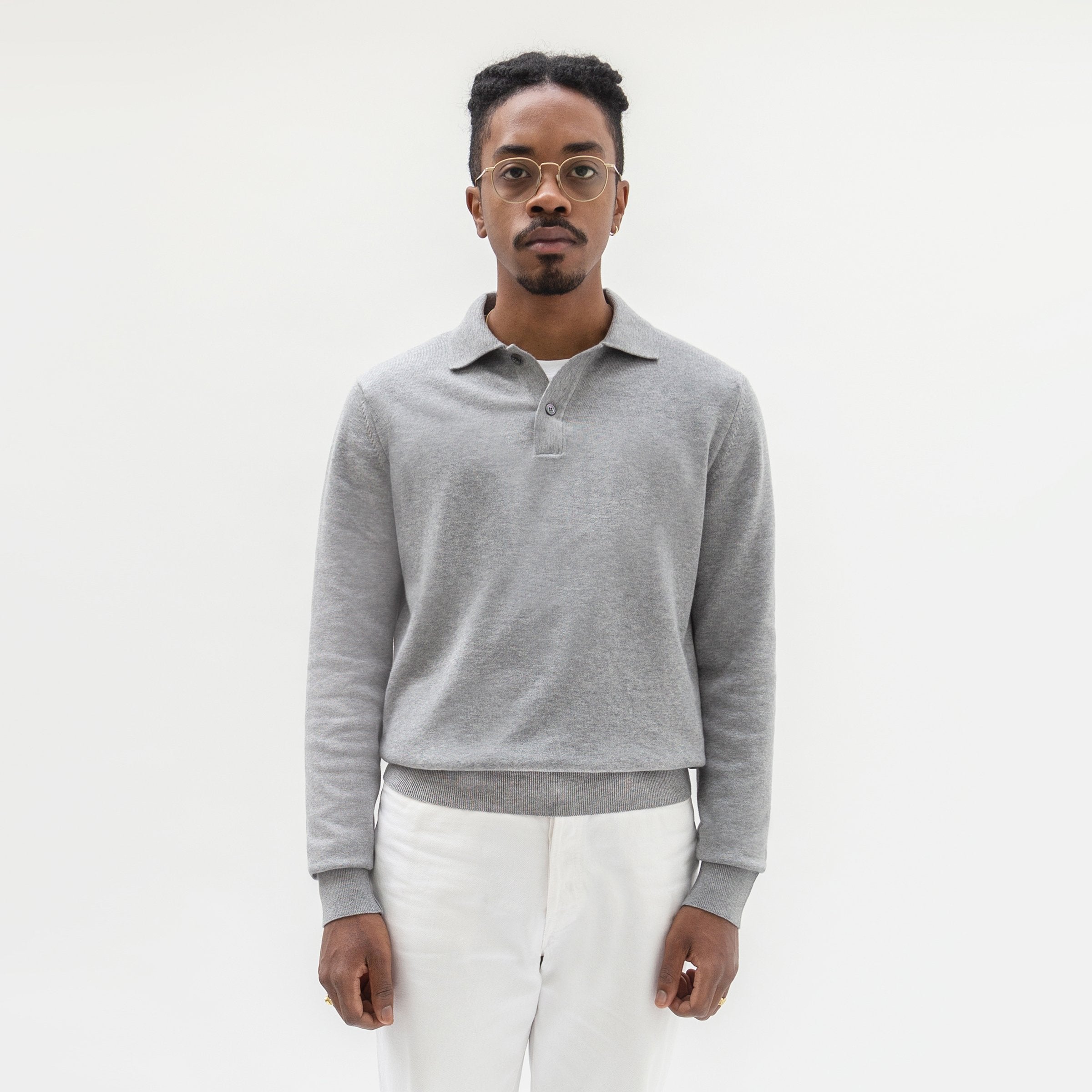 Bloke is wearing a grey sweater